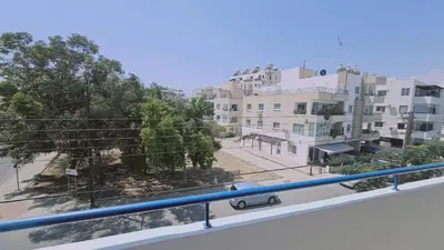 a view of a city street from a balcony at STAY Local Apartment in Larnaka