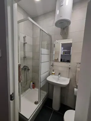 a bathroom with a shower and a sink at Studio in the centre of Nicosia 2 in Nicosia