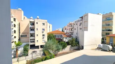 a view from a balcony of buildings in a city at Lovely 1BR in Old Town - City Center & 4min to Beach in Scala