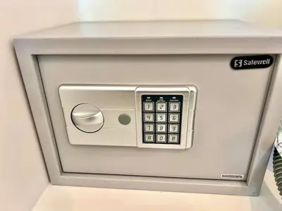 a white safe with a sslagency button on it at Cristiana Sea Breeze, Sleeps 3, Free Wifi in Limassol