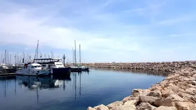 a group of boats docked in a harbor at Ithaki Phinikoudes Apartment No. 102 in Larnaka