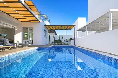 a swimming pool in a house at Villa Evelin - Ayia Napa Resort Center in Ayia Napa