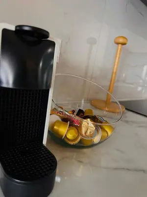 a black brush sitting next to a bowl of food at Sea view 3 bedrooms apartment in Limassol