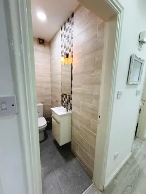 a bathroom with a toilet and a sink at Sea view 3 bedrooms apartment in Limassol