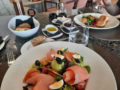 a table with plates of food on top at Nicosia 360 Luxury Living A in Nicosia