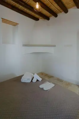 a room with two white towels on a bed at Dipaton House in Vasa 1 in Limassol