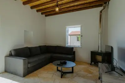 a living room with a couch and a table at Dipaton House in Vasa 1 in Limassol