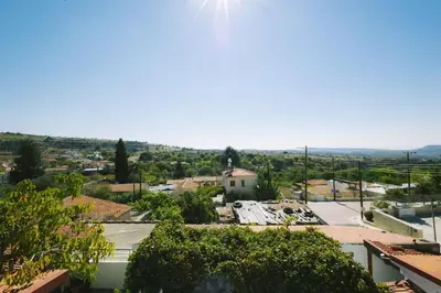 a view of a city from the roof of a building at Dipaton House in Vasa 2 in Vasa Kilaniou