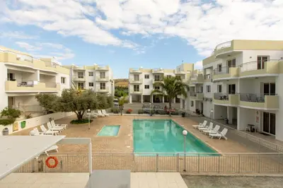 an image of an apartment complex with a swimming pool at Obv 5201 in Pyla