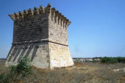 a brick tower sitting on top of a hill at Villa Anthea-beach-private pool in Meneou
