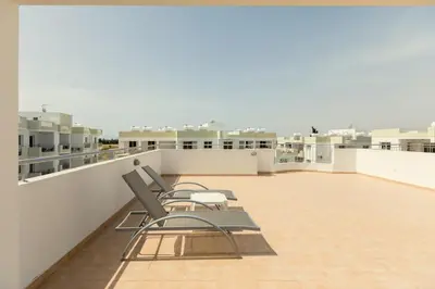 two benches on the roof of a building at Obv 2304 in Pyla