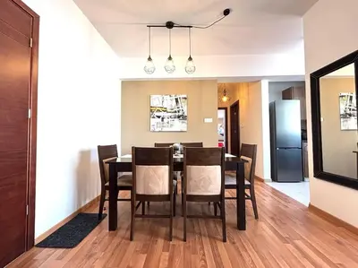 a dining room with a table and chairs at One Bedroom Flat in Central Nicosia in Nicosia