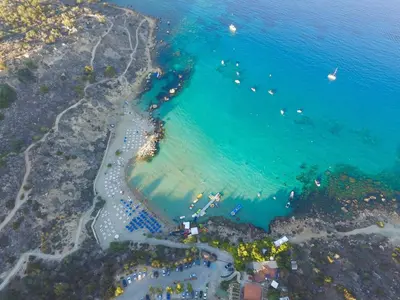 an aerial view of a beach with boats in the water at Villa Atlantis in Protaras