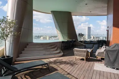 a view from the top of a building with tables and chairs at WealthyStays 360 Luxury Residence in Nicosia