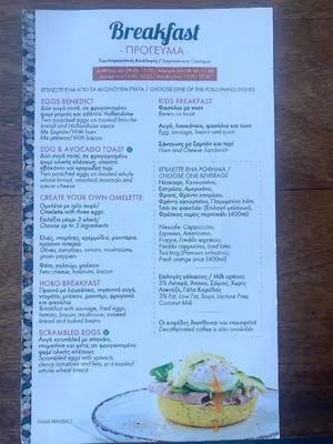 a menu for the breakfast first theorem with a sandwich at Ithaki Phinikoudes Apartments No. 106 in Larnaka