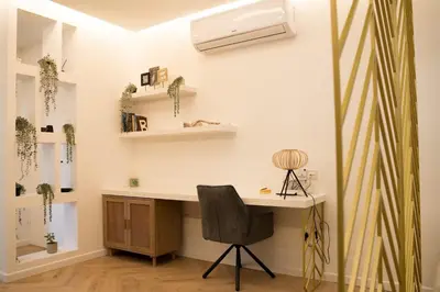 a home office with a desk and a chair at Delightful 1st Floor Xanthippis Apartment in Strovolos