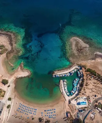 an aerial view of a beach and the ocean at Gold Sand Villa in Protaras