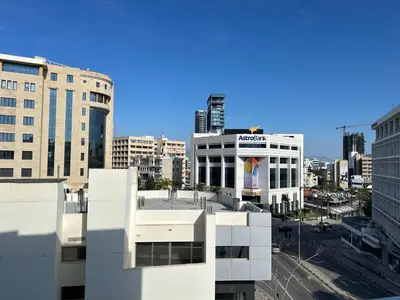 a view of a city with tall buildings at Aurora Downtown Living in Nicosia