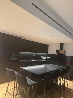 a dining room with a table and chairs at Nicosia Delux in Nicosia