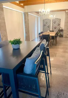 a dining room with a table and chairs at Sea View Penthouse in Larnaka