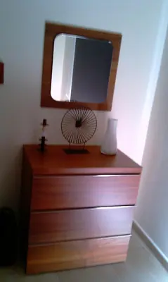 a dresser with a mirror on top of it at Mythical Sands Resort - Africa in Protaras