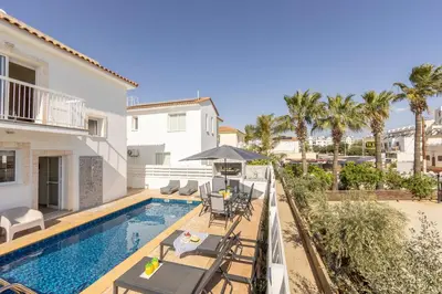 an image of a swimming pool in a villa at Protaras Villa Cemelia in Protaras