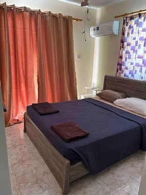 a bedroom with a bed with two towels on it at Lovely Paradise - 1-bd apt in Kapparis - Protaras in Paralimni