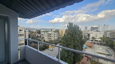 a balcony with a view of a city at STAY Velvet Apartment in Limassol