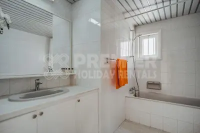 a bathroom with a sink and a mirror at Villa Andreas in Protaras