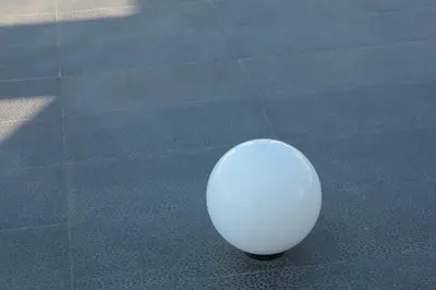 a white egg sitting on top of a carpet at Marymina Villa in Protaras