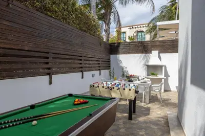a backyard with a pool table and a ping pong ball at Villa Protaras View 6 Central Protaras -Fig Tree Bay-Jacuzzi-Hot Tub in Protaras
