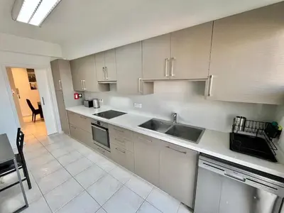 a kitchen with a sink and a counter top at Spacious 3-Bedroom Apartment in Limassol in Limassol