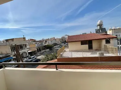 a view of a city from the balcony of a building at Spacious 3-Bedroom Apartment in Limassol in Limassol