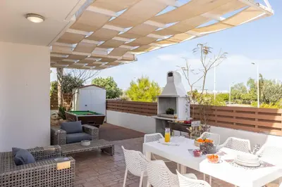 a patio with a table and chairs and a grill at Villa Protaras View 9 Central Protaras -Fig Tree Bay-Jacuzzi-Hot Tub in Protaras
