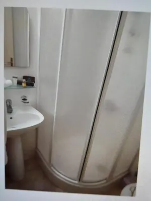 a bathroom with a shower and a sink at Beautiful 1-Bed House in Aglantzia