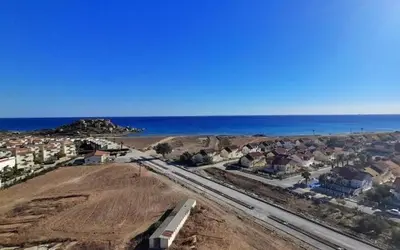 an aerial view of a city with the ocean at Beautiful 1-Bed House in Aglantzia