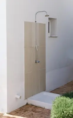 a shower with a shower head in a bathroom at Nissini Villas in Ayia Napa