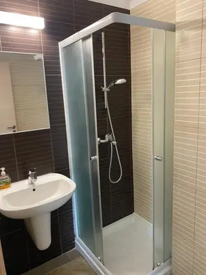 a bathroom with a shower and a sink at Apartment Lorena Protaras in Protaras