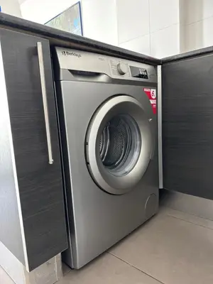 a washer and dryer sitting in a room at Apartment Lorena Protaras in Protaras