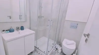 a bathroom with a shower and a toilet and a sink at STAY Napa Oasis Studio in Ayia Napa