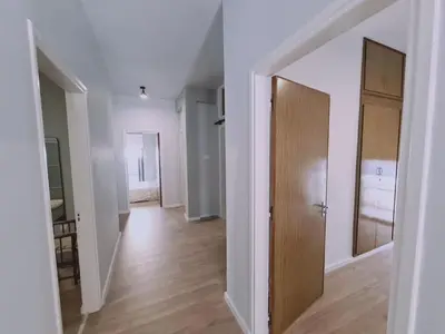 an empty room with a hallway with a door at Limassolian vibe house in Limassol