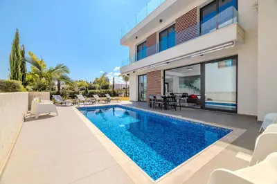 an image of a swimming pool in a house at By The Beach - Aura Villa in Protaras