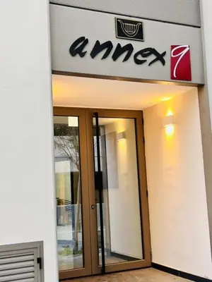 a msg sign on the side of a building at 9 Muses Holiday apartments in Larnaka