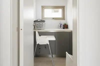 a bathroom with a sink and a mirror at New Luxury 2BR Seaview Apt, Sun City, Pool and Beach in Ayia Napa