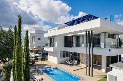 a villa with a swimming pool and a house at Levanda Hills Escape in Protaras in Paralimni