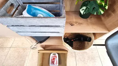 a drawer in a wooden box with tools in it at 2 Beachside Apts, 5min Walk to Shore with Internet in Larnaka