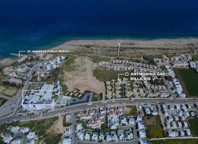 an aerial view of an apartment complex next to the ocean at Anthorina Greco Villa #10 in Protaras
