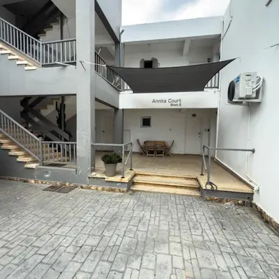 a view of the entrance to anantart court building at Azure Retreat in Ayia Napa
