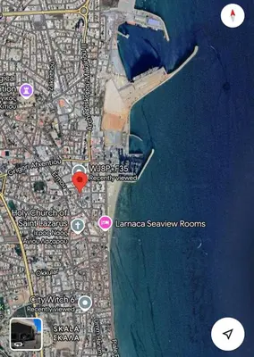 a map of a city and the water at Sia-Serenity Finikoudes Apartment in Larnaka