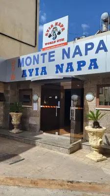 a building with a sign that reads minute napka ayaja napa at HANA Holiday house in Ayia Napa